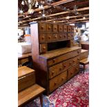 American Primitive apothecary cabinet 18th century, the superstructure with sixteed drawers above