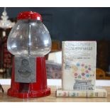 Vintage red enameled gumball machine, 14.5"h