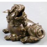 A Chinese Bronze incense burner of recumbent foo lion, size: 4.25"h