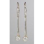 Pair of diamond, 14k gold earrings Featuring (2) full-cut diamonds, weighing a total of