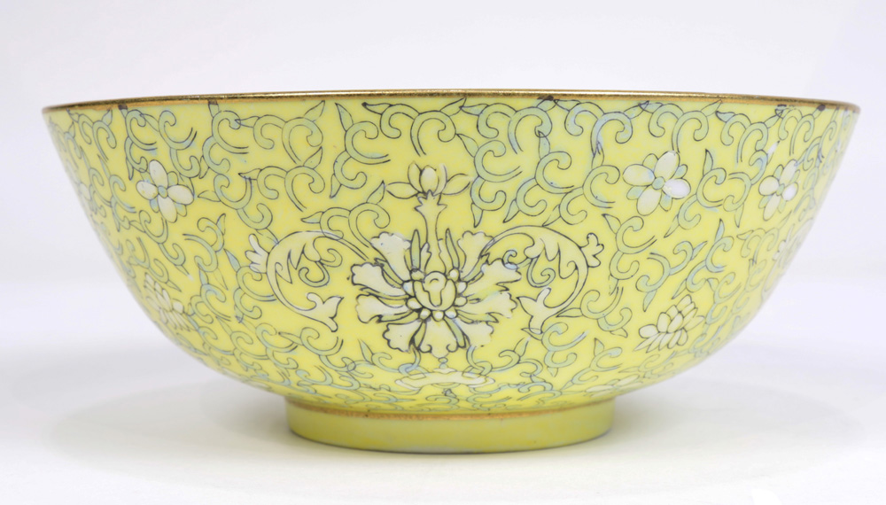 A Chinese yellow-ground bowl, both interior and exterior enamelled with flower and folige patternss, - Image 3 of 4