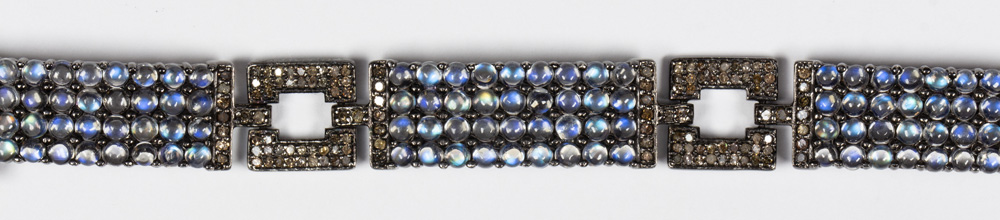 Moonstone, diamond, blackened silver bracelet Featuring (180) round moonstone cabochons, measuring