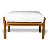 Hans Wegner for Getama Danish Modern oak footstool, having a rectangular seat above tapered legs,