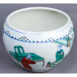 A Chinese enameled porcelain bowl, of compressed globular shape and painted with the story of "the