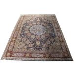 A Persian Kerman carpet, 10'1" x 14'