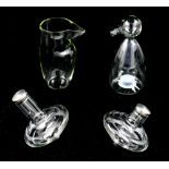 (lot of 4) Clear glass group, consisting of a pair of Droog wobble salt and pepper shakers, having a