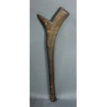 A large Fijian club, the elaborately carved pole executed in a lightweight wood, age uncertain, 36"