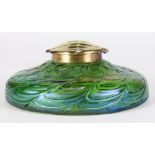 A Loetz inkwell, having a bronze cap, above a green glass body with raised spiral swirls, 2.5"h