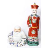 (lot of 2) Two Chinese Porcelain figures, one is a Manchurian official, the other a Maitreya buddha,