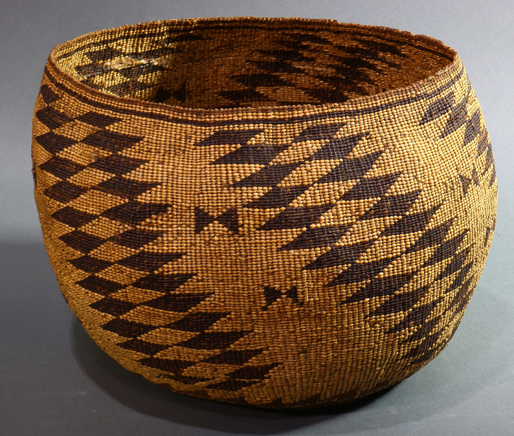 A Large American Indian Pit River twined basket, early 20th Century the wide rim and bulbous body