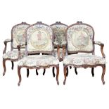 (lot of 4) Louis XV fauteuils, 18th century, each with a floral carved crest above original tapestry