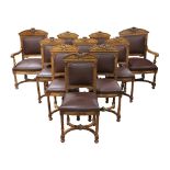 (lot of 10) A set of Renaissance style walnut carved dining chairs, having a carved crest above