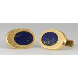 Pair of lapis lazuli, 14k yellow gold cufflinks Featuring (2) oval inlaid plaques of lapis lazuli,