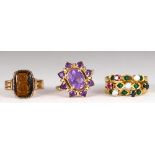 (Lot of 3) Multi-stone, yellow gold rings Including 1) amethyst and 14k yellow gold ring, size 6; 1)