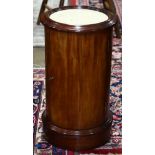 Continental style marble top plant stand, the circular form having a captured marble top above the