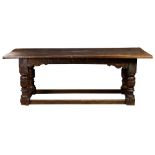 An early Spanish Revival refectory table, early 18th century, having a rectangular plank top above