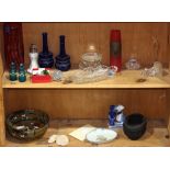 Two shelves with glass and earthenware items, including (3) paperweights, (3) scent bottles, a
