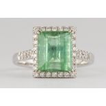 Tourmaline, 18k white gold ring Featuring (1) rectangular-cut tourmaline, weighing approximately 2.