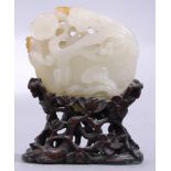 A Chinese hardstone carving of flowering gourd, size with stand: 3"h x 2.25"w. Provenance: from a