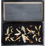 (lot of approx. 34) A grouping of Northwest Coast Native American bone carvings and arrowheads,