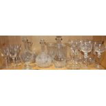 One shelf with glass table articles including (2) Brilliant cut glass carafes, (8) wine glasses, cut