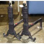 Pair of cast iron figural andirons, 15"h