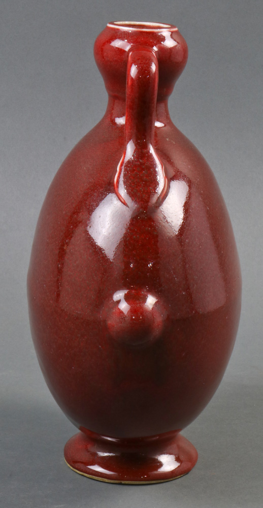 A Chinese copper red glazed porcelain moon-flask vase, of flattened circular shape raised on a low - Image 3 of 5