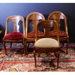 (lot of 4) Empire mahogany parlor chairs, each having a stylized T form back and rising on