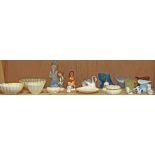 One shelf with (5) Belleek dishes, (3) Hummell figures, a Lenox bell and box, a Lladro seated girl