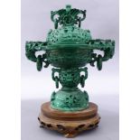 A carved Chinese malachite archaistic censer, top finial decorated with tree rings, the compressed