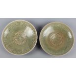 (lot of 2) Vietnamese celadon glazed ceramic plates, Ly dynasty (11th/12th c), each incised with a