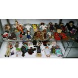(Lot of approx. 25) Two shelves of assorted dolls, including International examples, largest: 10"l