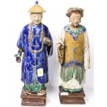 (lot of 2) Two Chinese Qing Dynasty style Porcelain figures, one is a Manchurian official, the other