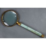 A magnifying glass with Chinese Jadeite handle., with carved gilt silver circular mount to the glass