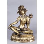 A gilt copper alloy figure of bodhisattva, seated upon a double lotus base with the right hand