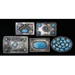 (lot of 5) A Southwest turquoise mounted silver belt buckle lot: two stamped "sterling", one of oval