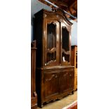 French Provincial Louis XV style walnut bookcase breakfront, the superstructure with twin wire