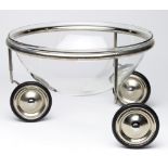 An Arnout Visser for Designum "Fruit on Wheels" bowl, 1993, having a glass insert above a wheeled