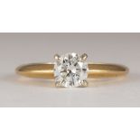 Diamond, 14k yellow gold ring Featuring (1) round brilliant-cut diamond, weighing approximately 0.70