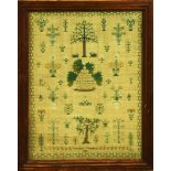 Framed needlework sampler executed by Caroline Chapman 1832, having floral and tree form reserves,