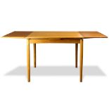 Modern occasional table, having a extendable rectangular top, above tapered legs, 27.5"h x 35.5"