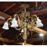 Five light hanging fixture in the Victorian taste, having reticulated S form arms continuing to