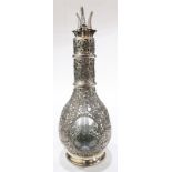 A Chinese Export silver overlay glass decanter, Hong Kong, the French manufactured four chambered