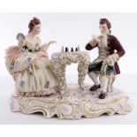 Dresden porcelain figural group, depicting chess players, the lady having a crinoline dress, 6.5"h