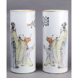 (lot of 2) A pair of Qianjiangcai cylindrical vases, both decorated with scholar and children,
