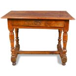 An English console table, having a rectangular top, above a single drawer and rising on turned legs,