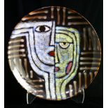 Ceramic charger, decorated with abstract geometric figures, 16"dia.