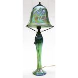 A Phoenix Studios iridescent art glass table lamp, having a mushroom form standard with a scarab