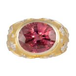 Tourmaline, diamond, 18k yellow gold ring Featuring (1) oval-cut pink tourmaline, weighing