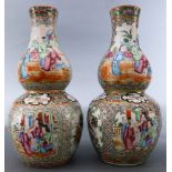 (lot of 2) A Pair of Chinese famille-rose double-gourd vases, each painted with figures and floral